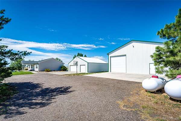 39 Acres of Agricultural Land with Home for Sale in Strasburg, Colorado