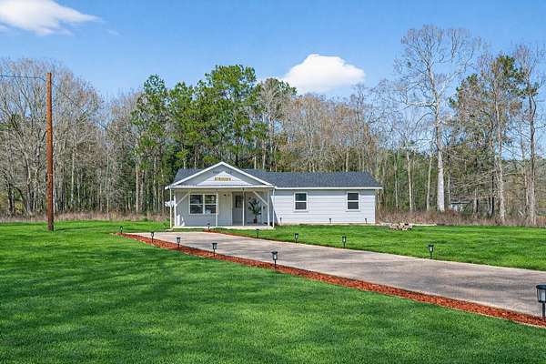 1.84 Acres of Land with Home for Sale in Shepherd, Texas