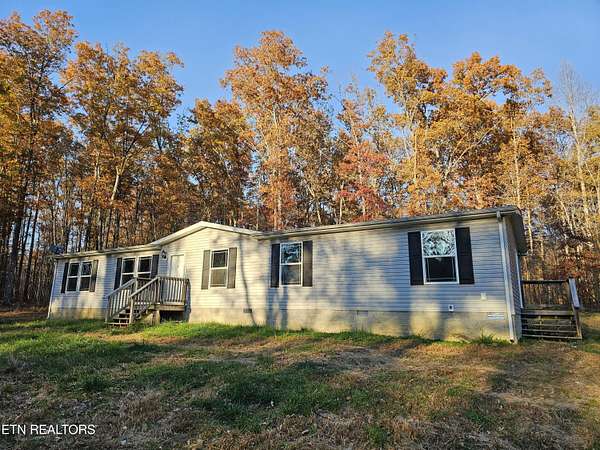 10.5 Acres of Land with Home for Sale in Sunbright, Tennessee