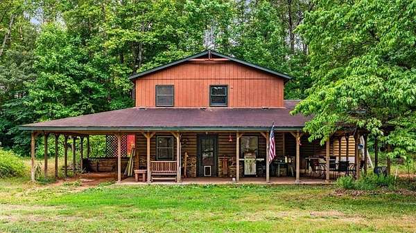 10.2 Acres of Land with Home for Sale in Gibsonville, North Carolina