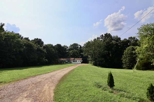 6.72 Acres of Land with Home for Sale in Dexter, Kentucky