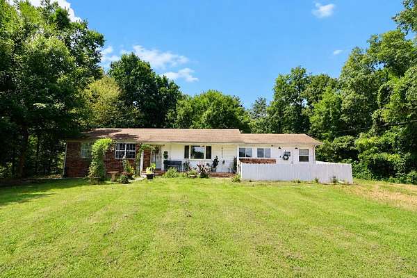 6.72 Acres of Land with Home for Sale in Dexter, Kentucky