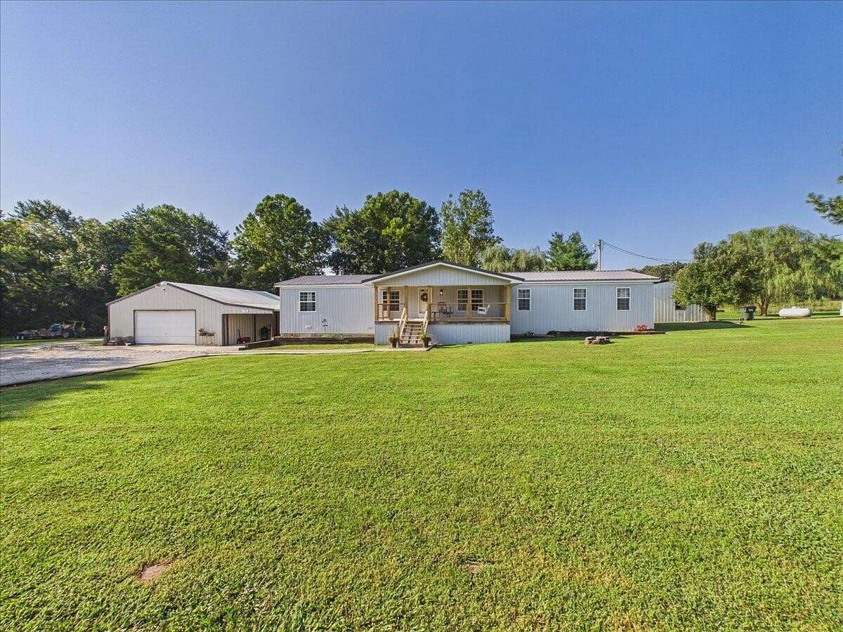 10 Acres of Land with Home for Sale in Buffalo, Missouri