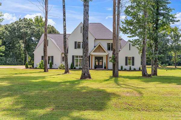 6.6 Acres of Land with Home for Sale in Eads, Tennessee