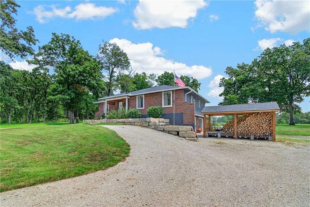 2.26 Acres of Land with Home for Sale in Peculiar, Missouri