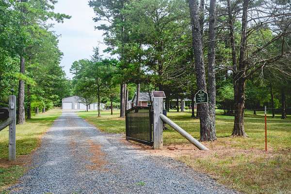 7 Acres of Land with Home for Sale in Mena, Arkansas