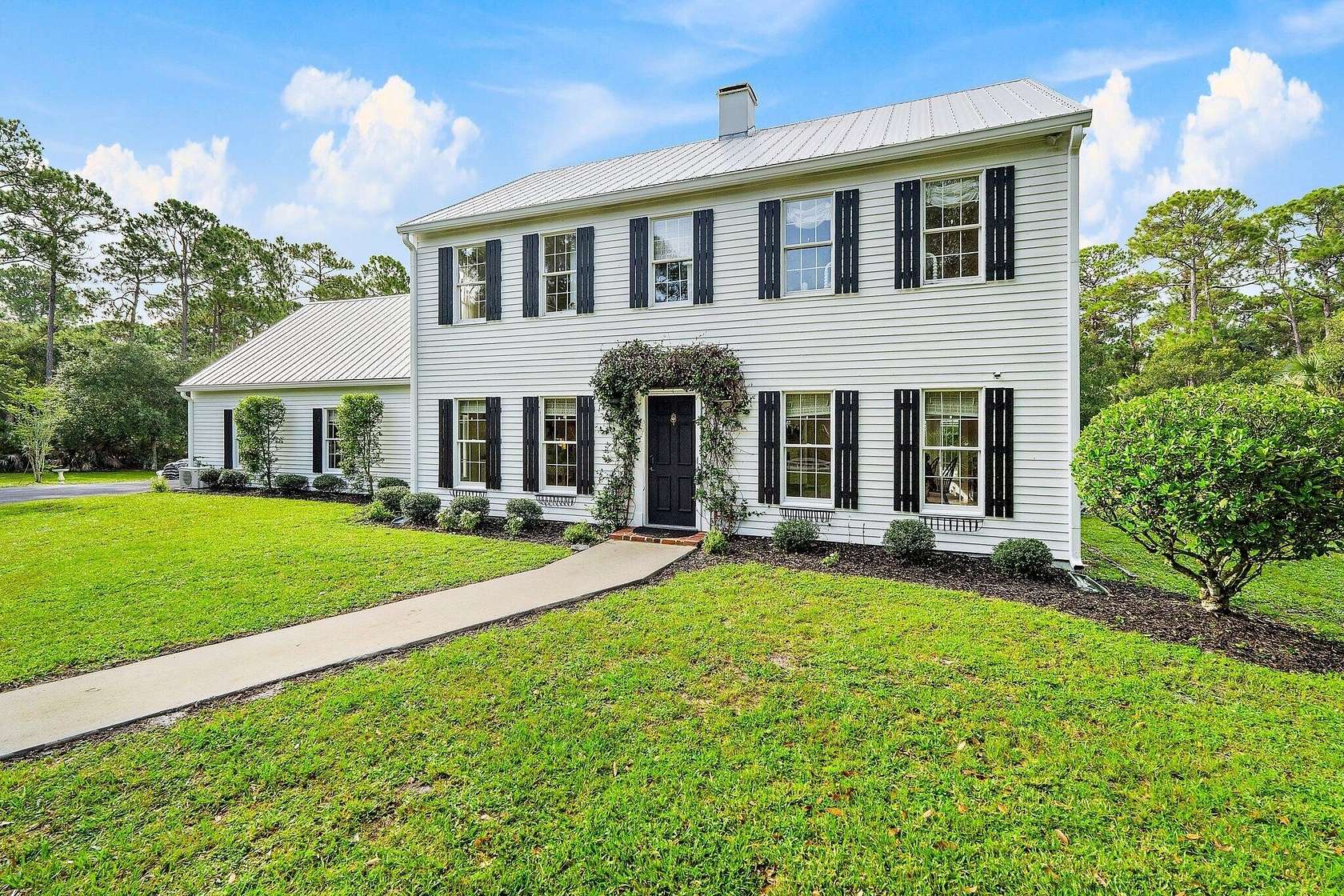 2 Acres of Land with Home for Sale in Palm City, Florida