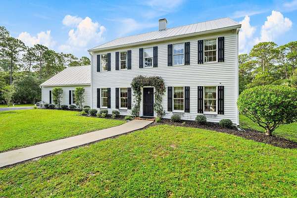 2 Acres of Land with Home for Sale in Palm City, Florida