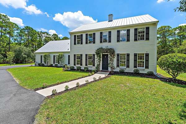 2 Acres of Land with Home for Sale in Palm City, Florida