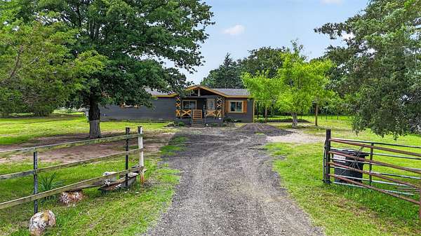 2.52 Acres of Land with Home for Sale in Quinlan, Texas