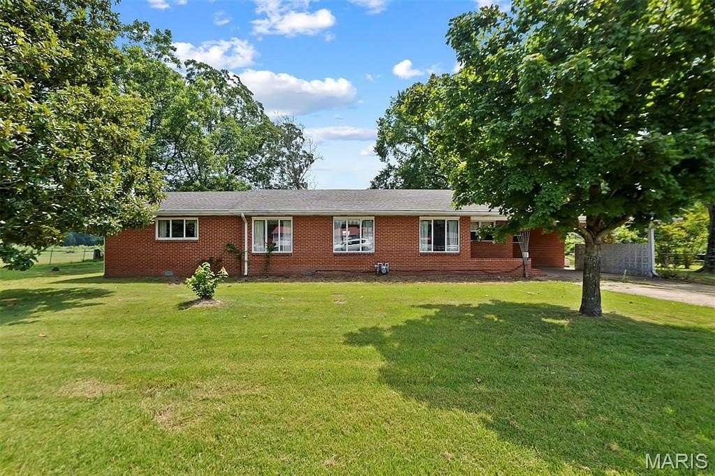 4.7 Acres of Land with Home for Sale in Poplar Bluff, Missouri
