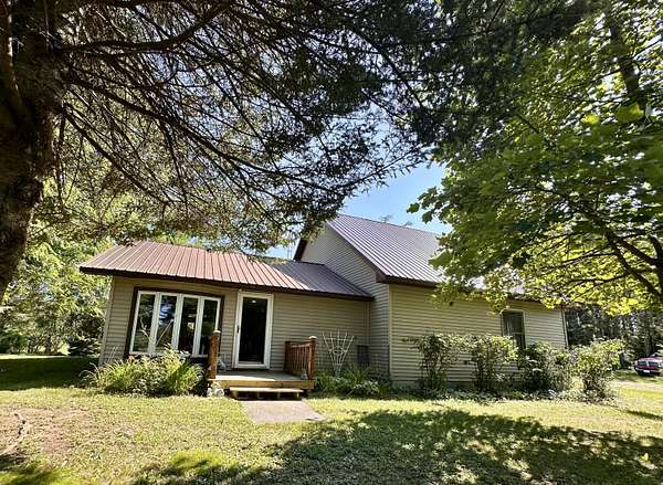 72 Acres of Agricultural Land with Home for Sale in Alpena, Michigan