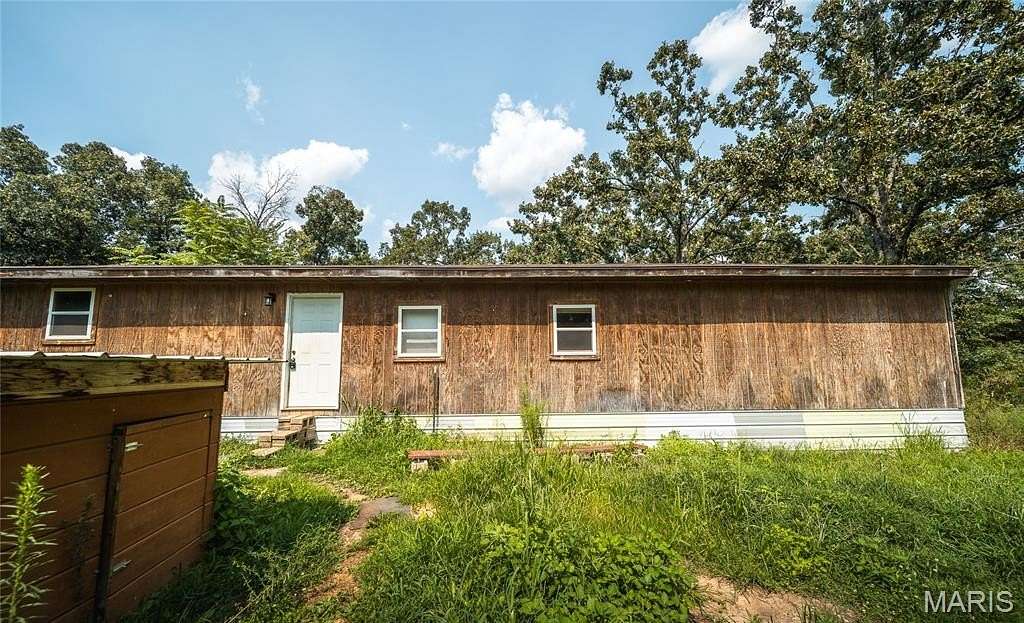 11.2 Acres of Land with Home for Sale in Montreal, Missouri