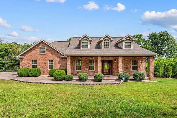 3.76 Acres of Land with Home for Sale in Galena, Missouri