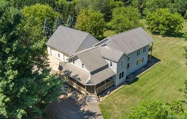 2.55 Acres of Land with Home for Sale in Oxford, Michigan