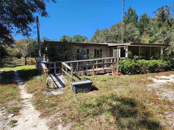 9.76 Acres of Land with Home for Sale in Ocala, Florida