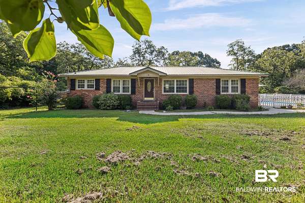 1.53 Acres of Land with Home for Sale in Irvington, Alabama