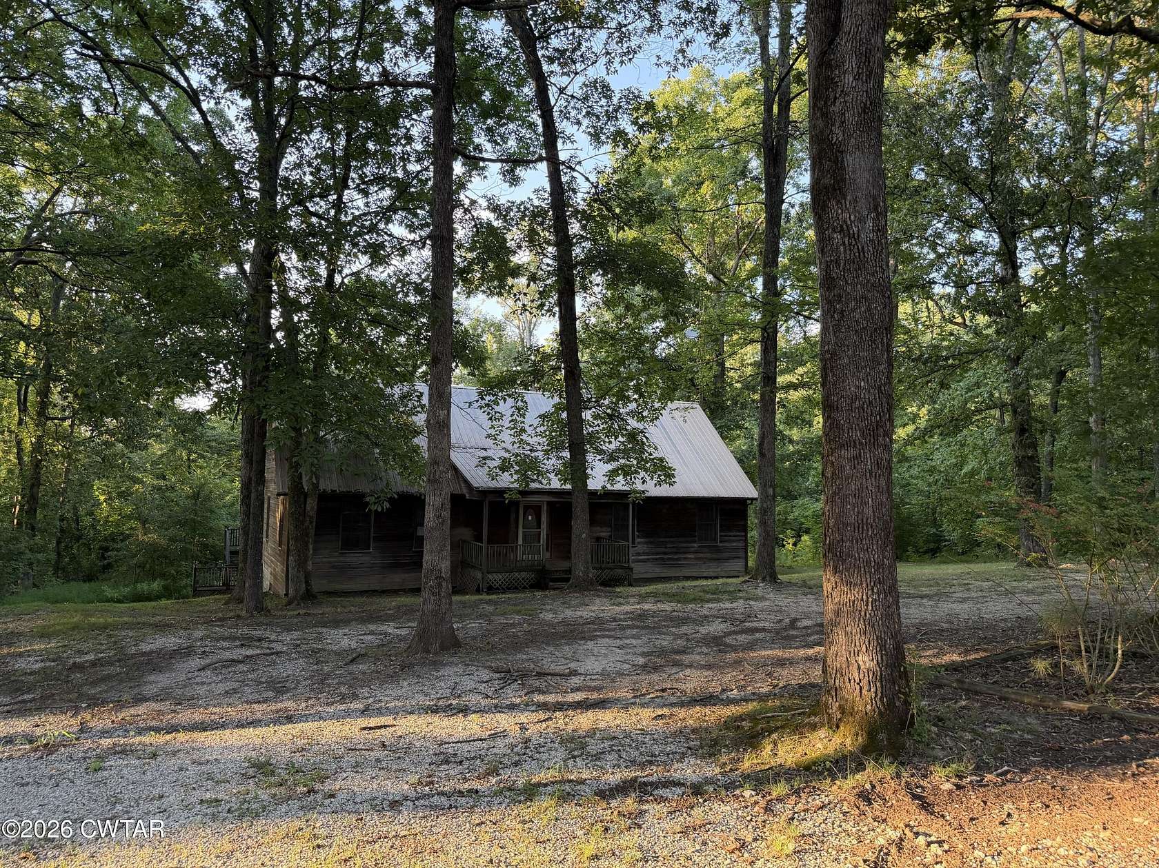 20.2 Acres of Recreational Land with Home for Sale in Big Sandy, Tennessee