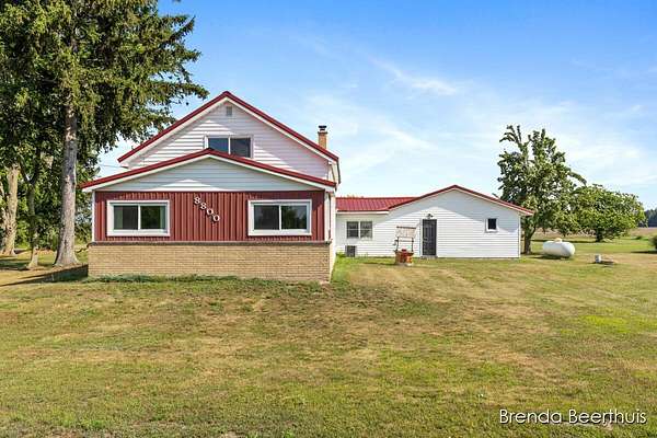 1.58 Acres of Land with Home for Sale in Ravenna, Michigan