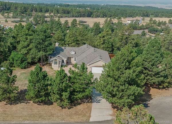 5 Acres of Land with Home for Sale in Franktown, Colorado