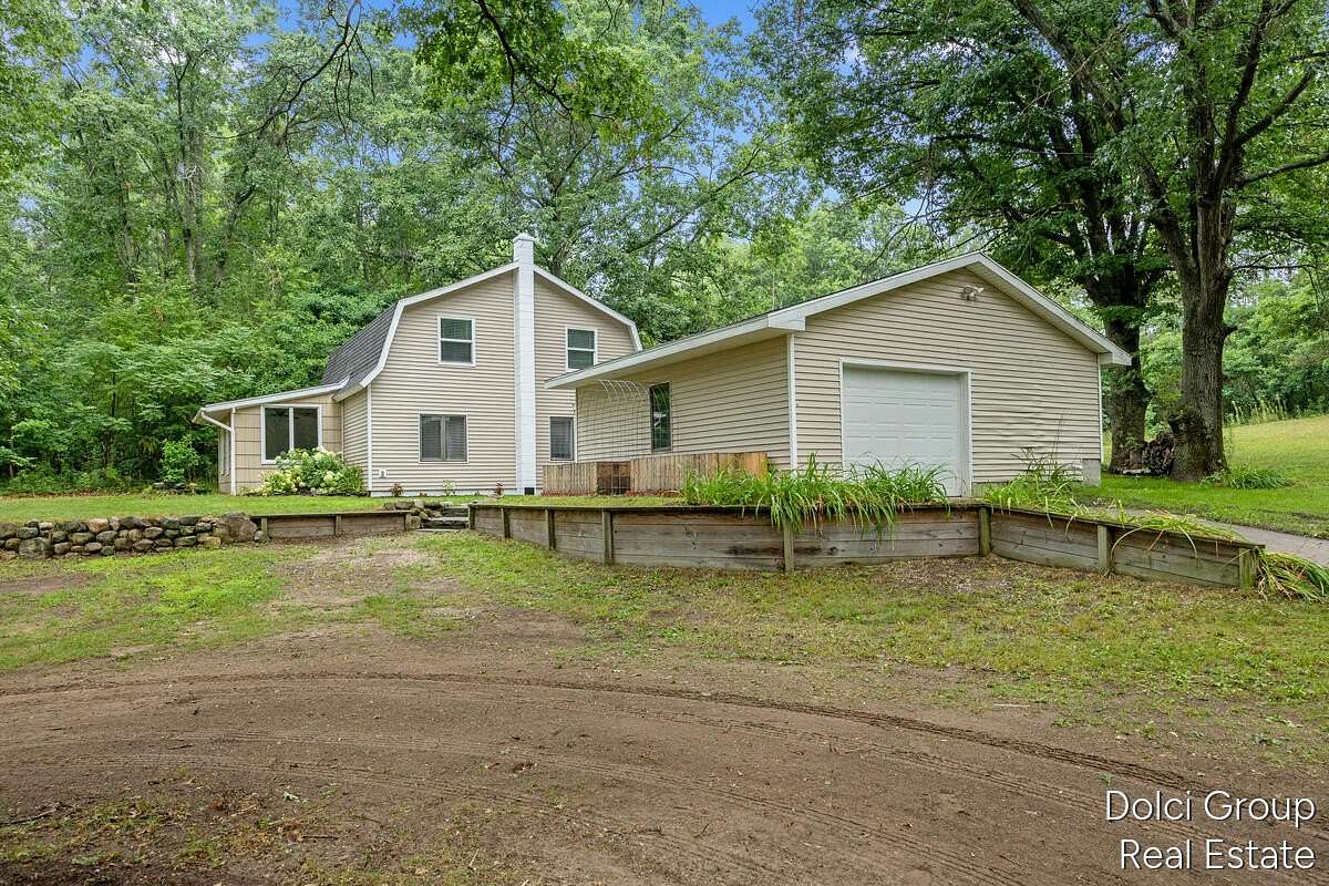 10 Acres of Land with Home for Sale in White Cloud, Michigan