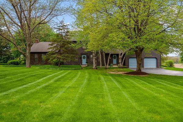5 Acres of Land with Home for Sale in Belvidere, Illinois