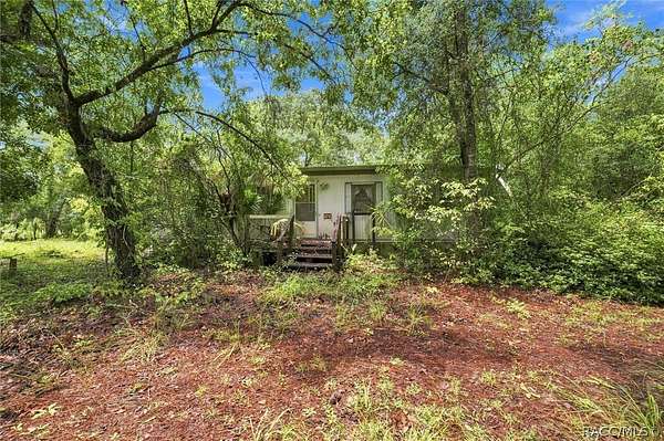2.4 Acres of Land with Home for Sale in Homosassa, Florida