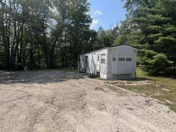 1.14 Acres of Land with Home for Sale in Harrison, Michigan