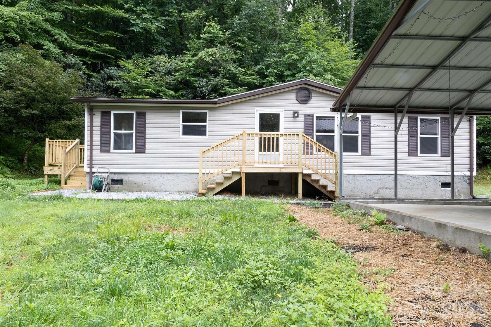 2.1 Acres of Land with Home for Sale in Lake Toxaway, North Carolina