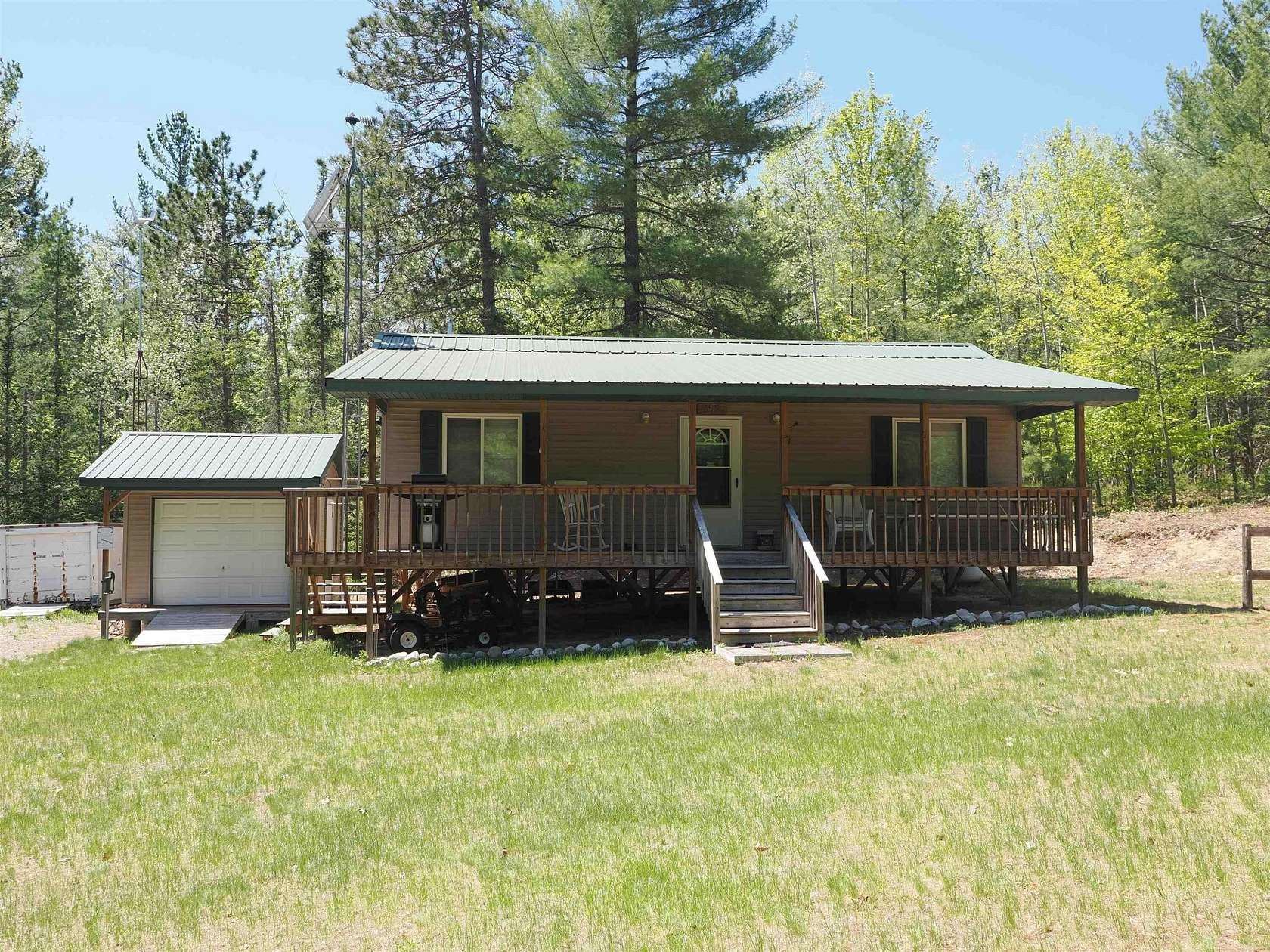 20 Acres of Recreational Land with Home for Sale in Afton, Michigan