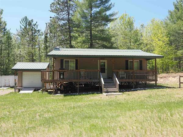 20 Acres of Recreational Land with Home for Sale in Afton, Michigan