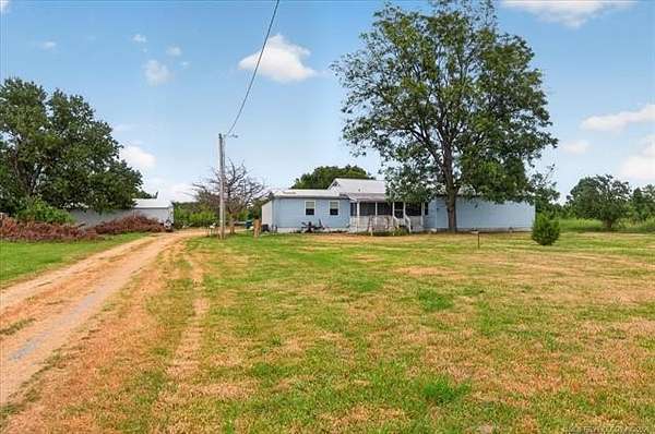 5 Acres of Land with Home for Sale in Nowata, Oklahoma