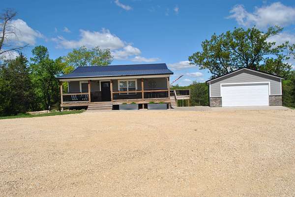 22 Acres of Recreational Land with Home for Sale in Garnavillo, Iowa