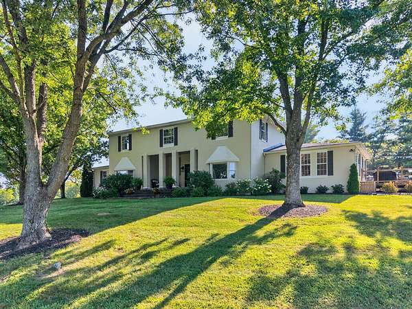 56.6 Acres of Land with Home for Sale in Paris, Kentucky