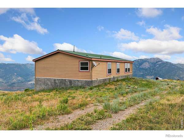 45 Acres of Recreational Land with Home for Sale in Loveland, Colorado