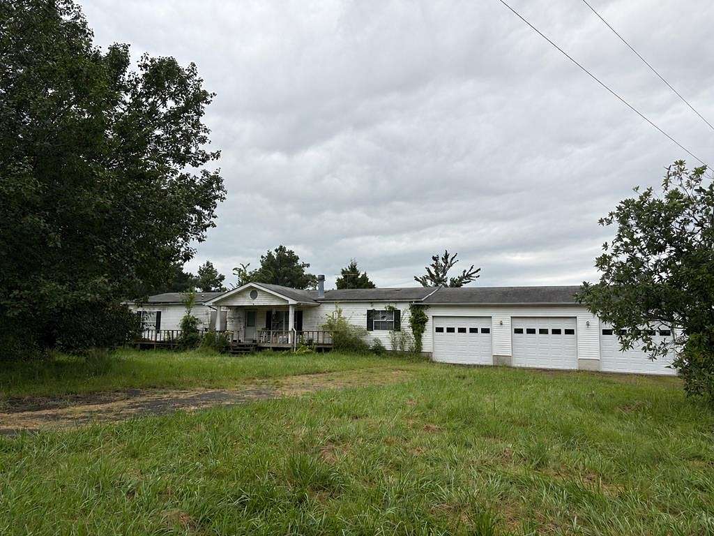 45 Acres of Recreational Land with Home for Sale in Cottage Grove, Tennessee