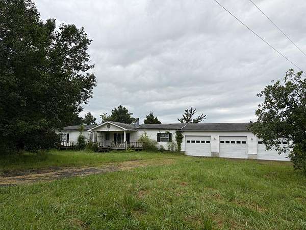 45 Acres of Recreational Land with Home for Sale in Cottage Grove, Tennessee