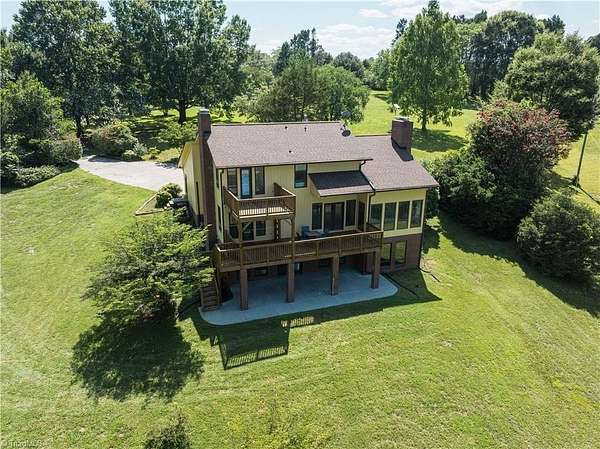 36.6 Acres of Recreational Land with Home for Sale in East Bend, North Carolina