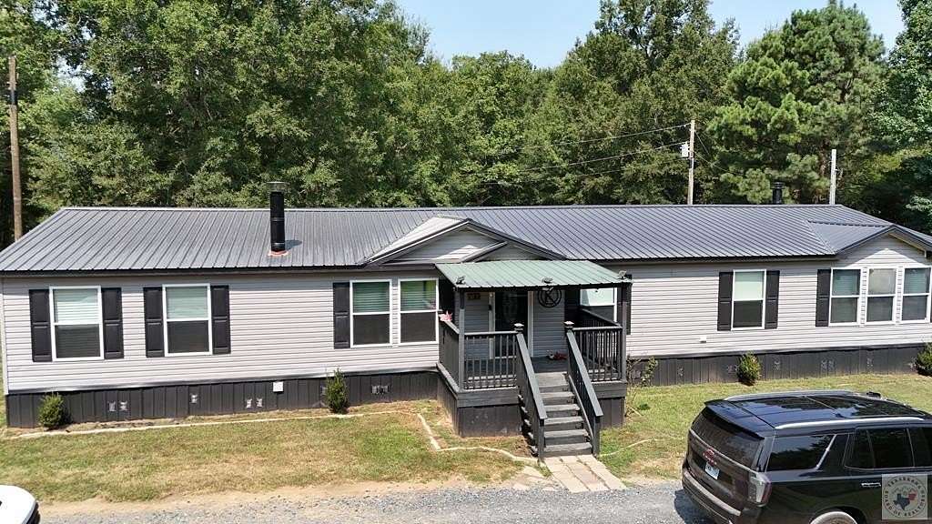 13.2 Acres of Land with Home for Sale in Fouke, Arkansas