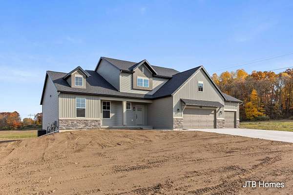 6.73 Acres of Land with Home for Sale in Lowell, Michigan