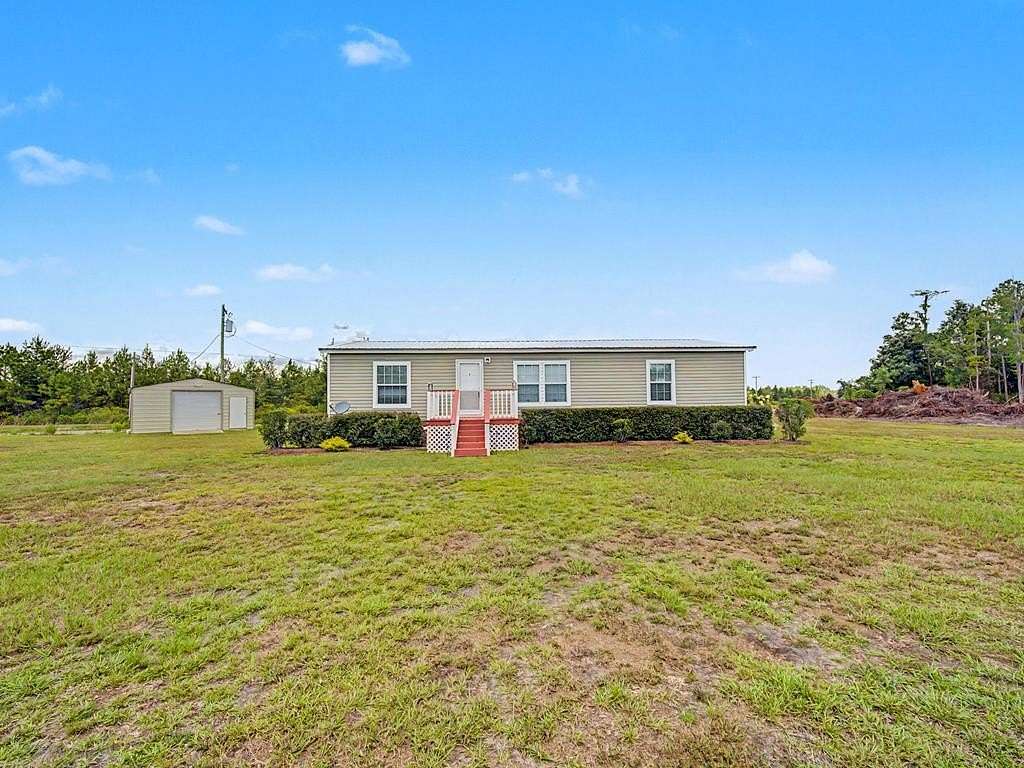 2 Acres of Land with Home for Sale in Du Pont, Georgia
