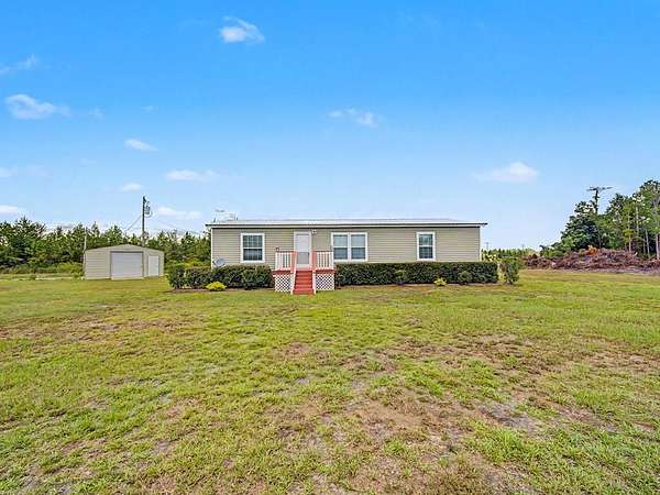 2 Acres of Land with Home for Sale in Du Pont, Georgia