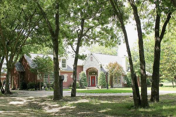 5 Acres of Land with Home for Sale in Forney, Texas