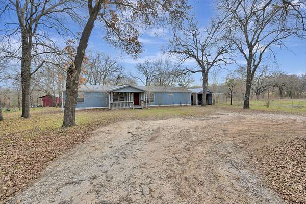 2.22 Acres of Land with Home for Sale in Covington, Texas