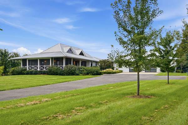 6.9 Acres of Land with Home for Sale in Lawrenceburg, Kentucky