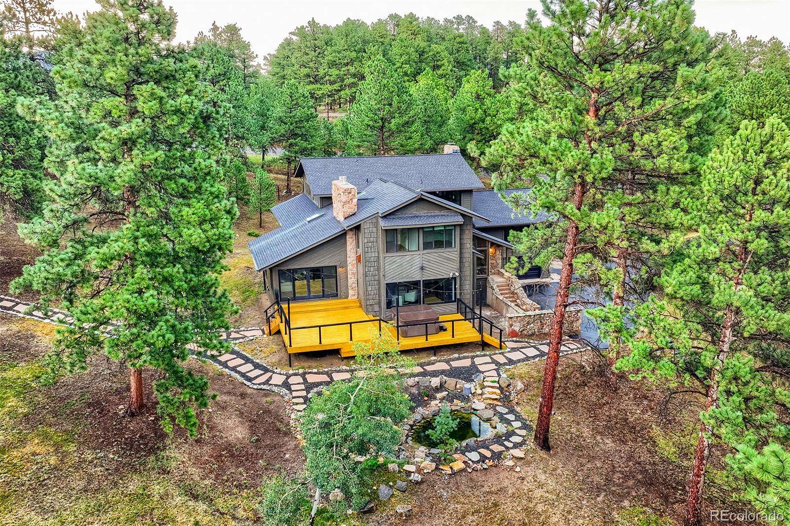 5 Acres of Land with Home for Sale in Evergreen, Colorado