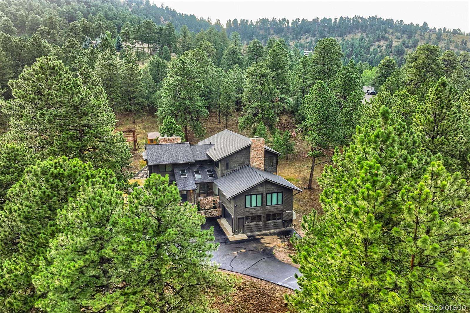 5 Acres of Land with Home for Sale in Evergreen, Colorado