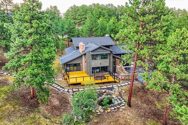 5 Acres of Land with Home for Sale in Evergreen, Colorado