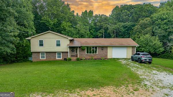 2 Acres of Land with Home for Sale in Waco, Georgia