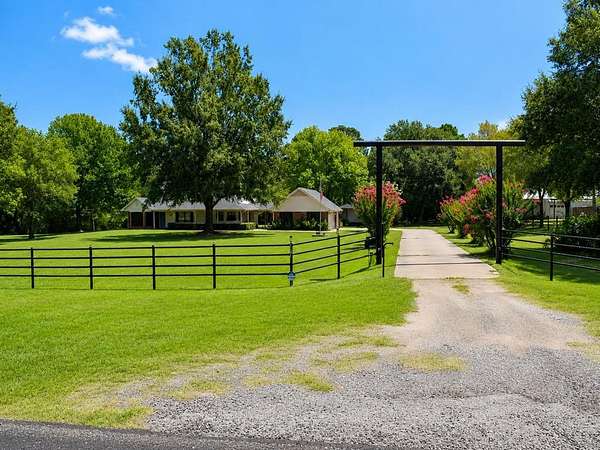2.5 Acres of Land with Home for Sale in Elkhart, Texas
